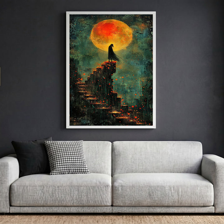 Wadi Home framed wall art featuring a cloaked figure on stairs under a blood-orange moon in a modern living room.