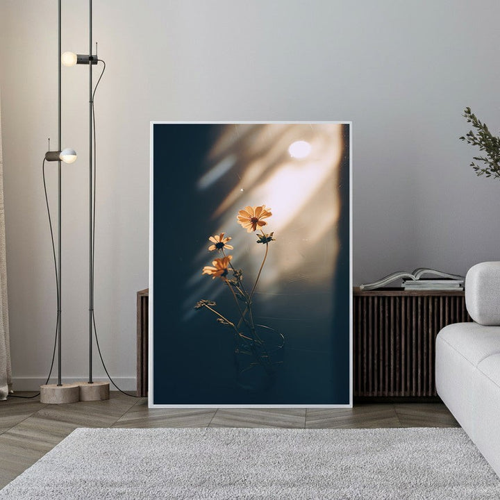 Wadi Home framed print of delicate orange flowers in a vase, bathed in soft sunlight with dramatic shadows.