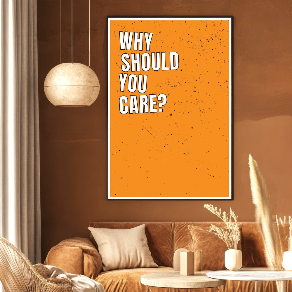 Wadi Home Why Should You Care typography poster with white text on a distressed orange background in a modern living room