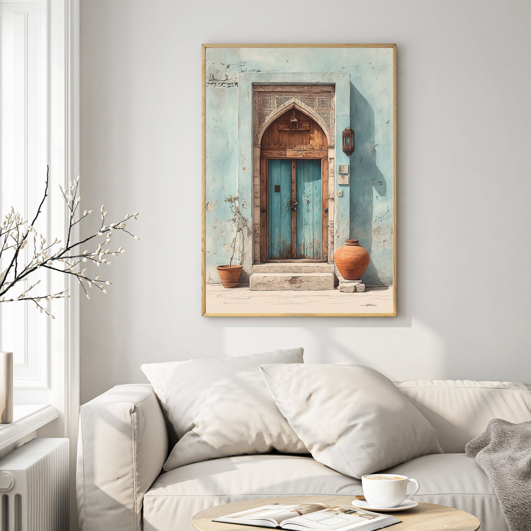 Wadi Home Ornate archway with distressed blue double doors, intricate carvings, and terracotta pots. Textured light blue wall.