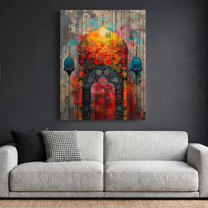 Wadi Home ornate architectural archway wall art print with vibrant red, gold, and teal colors above a modern sofa.