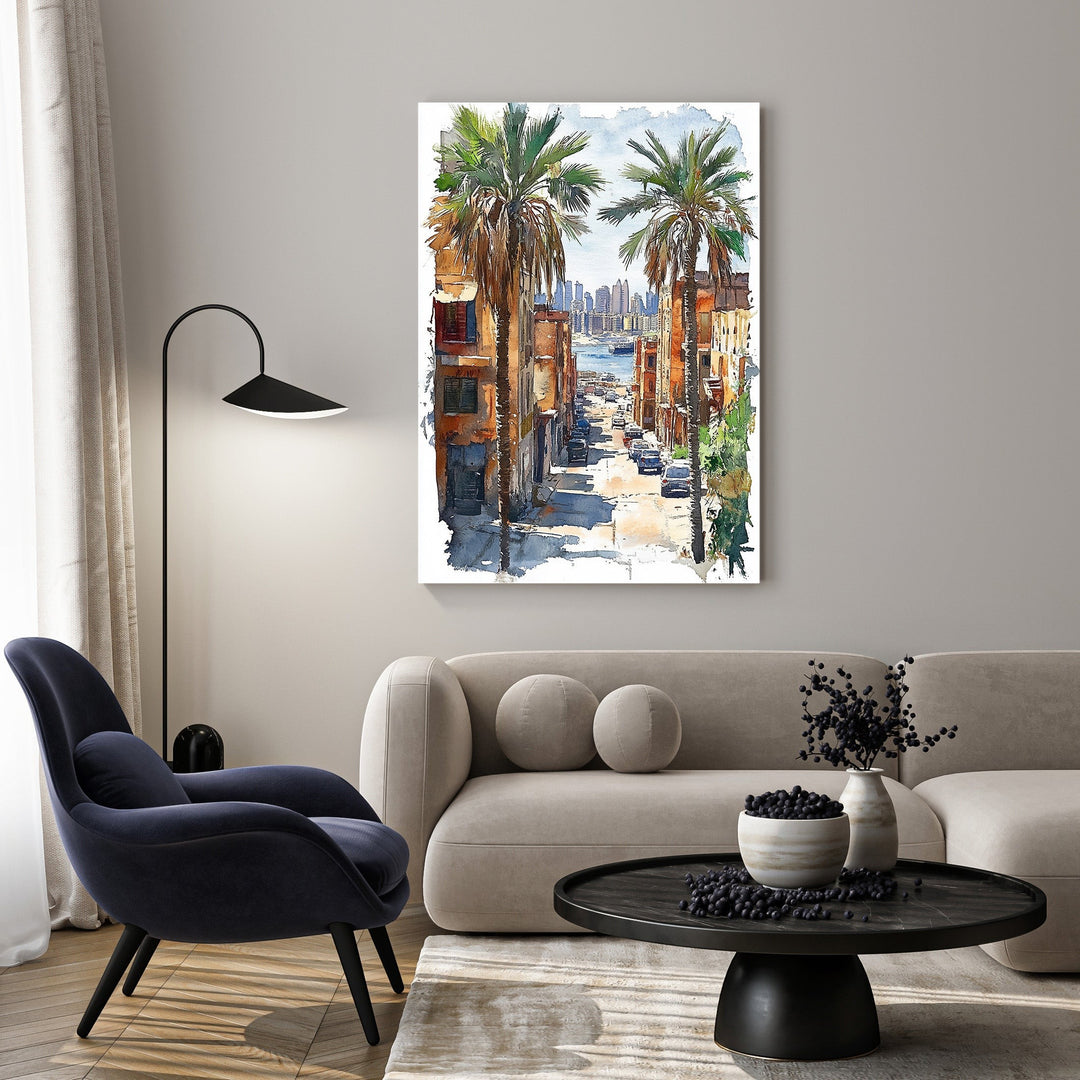 Wadi Home watercolor art of a city street with palm trees and buildings, depicting a coastal cityscape.