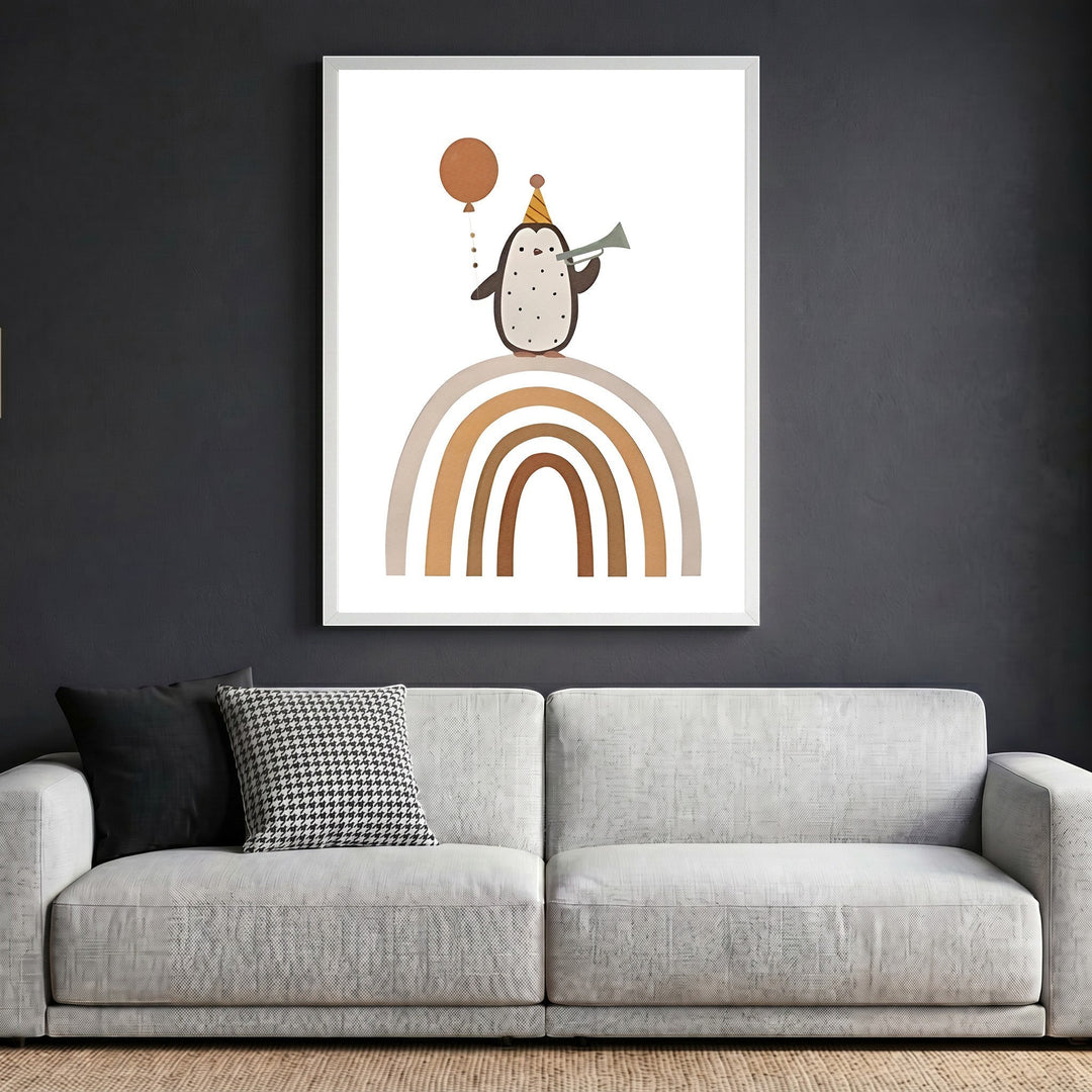 Wadi Home framed wall art featuring a whimsical penguin with a party hat and balloon on a rainbow in a modern living room