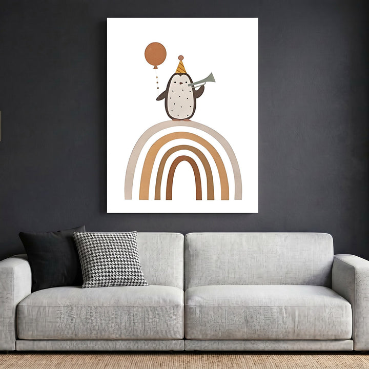 Wadi Home framed wall art featuring a whimsical penguin with a party hat and balloon on an earth-toned rainbow