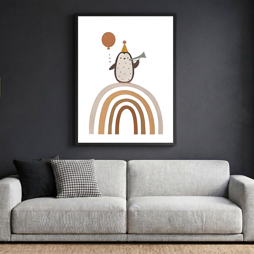 Wadi Home framed wall art featuring a whimsical penguin with a party hat and balloon on a rainbow in a modern living room