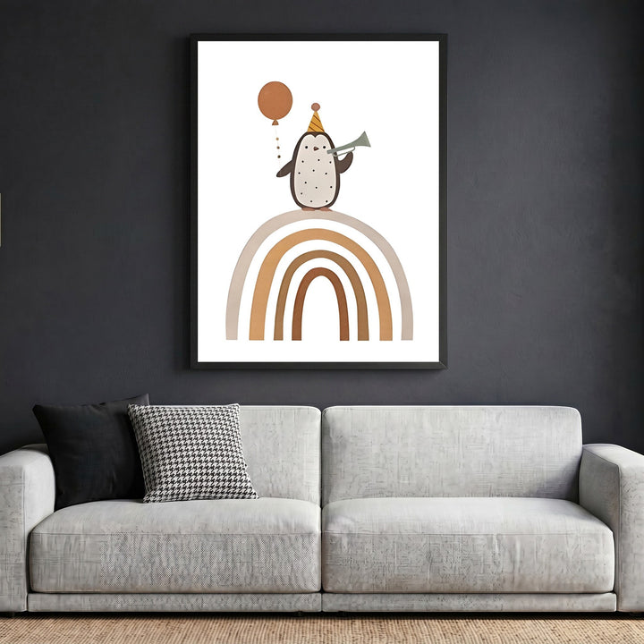 Wadi Home framed wall art featuring a whimsical penguin with a party hat and balloon on a rainbow in a modern living room