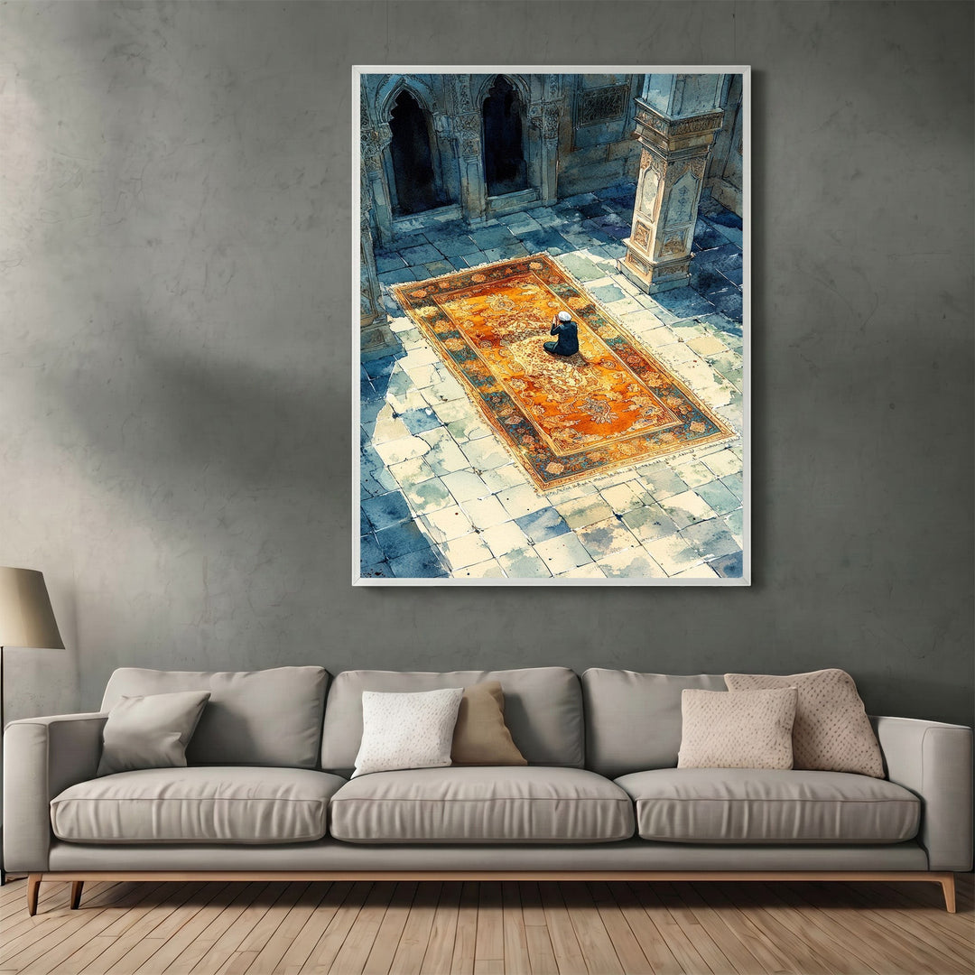 Wadi Home decorative wall art print featuring a person praying on an ornate rug in a sunlit stone courtyard.