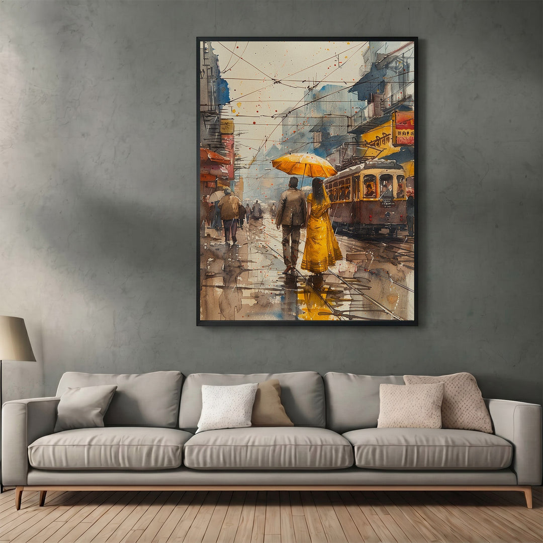 Wadi Home framed watercolor wall art featuring a couple with a yellow umbrella on a rainy city street above a sofa.