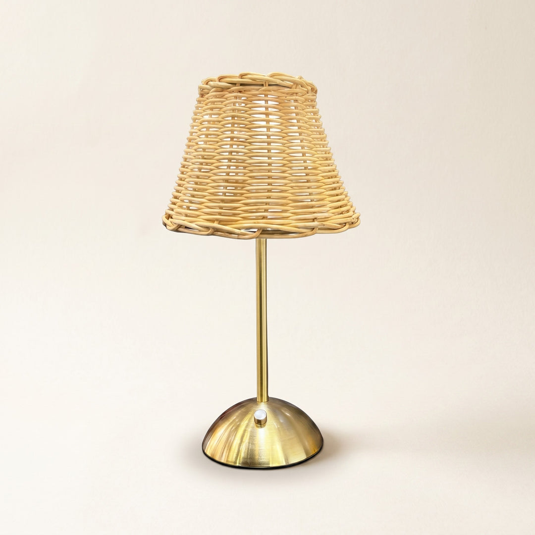 Wadi Home Woven Rattan Table Lamp with brushed brass metal base and stem, natural woven shade.
