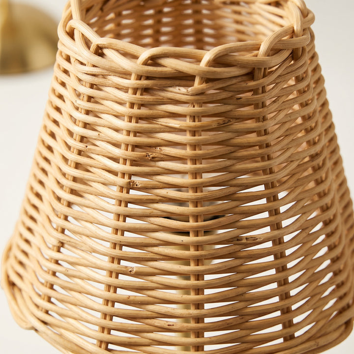 Wadi Home Woven Rattan Table Lamp with brushed brass metal base, natural woven shade.