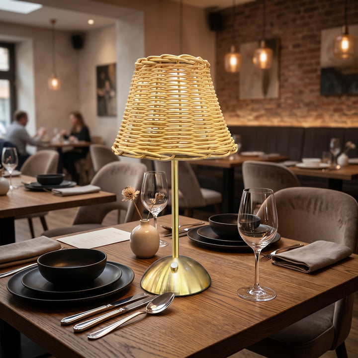 Wadi Home woven rattan table lamp with brushed brass metal base, natural beige shade.