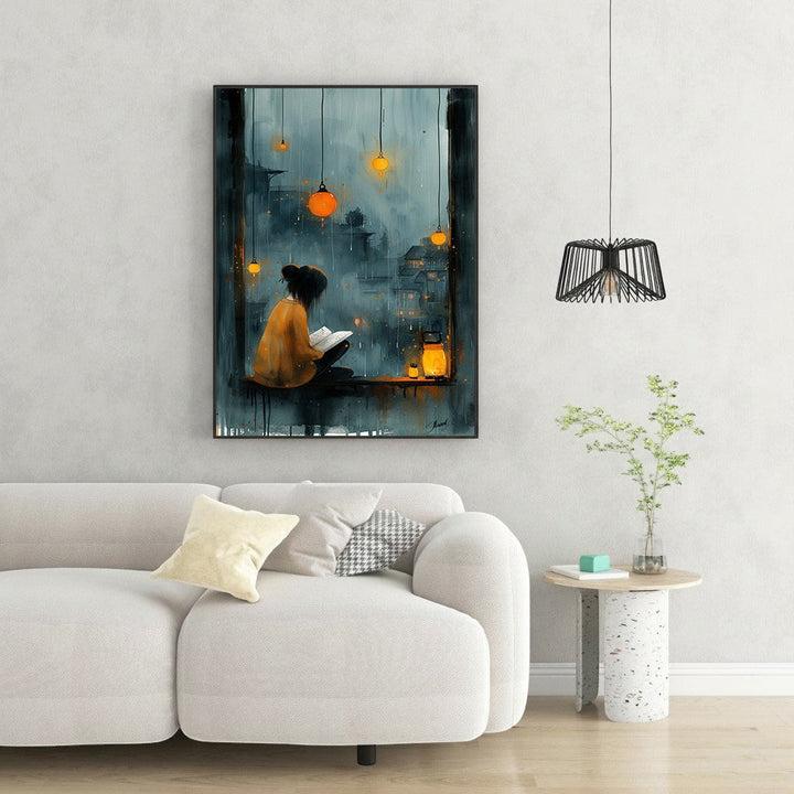 Wadi Home cozy reading nook wall art, woman reading by window with rain and lanterns, moody blues and orange hues.