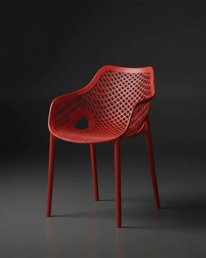 Wadi Home modern red armchair with an intricate lattice pattern, ergonomic seat, and durable minimalist design.