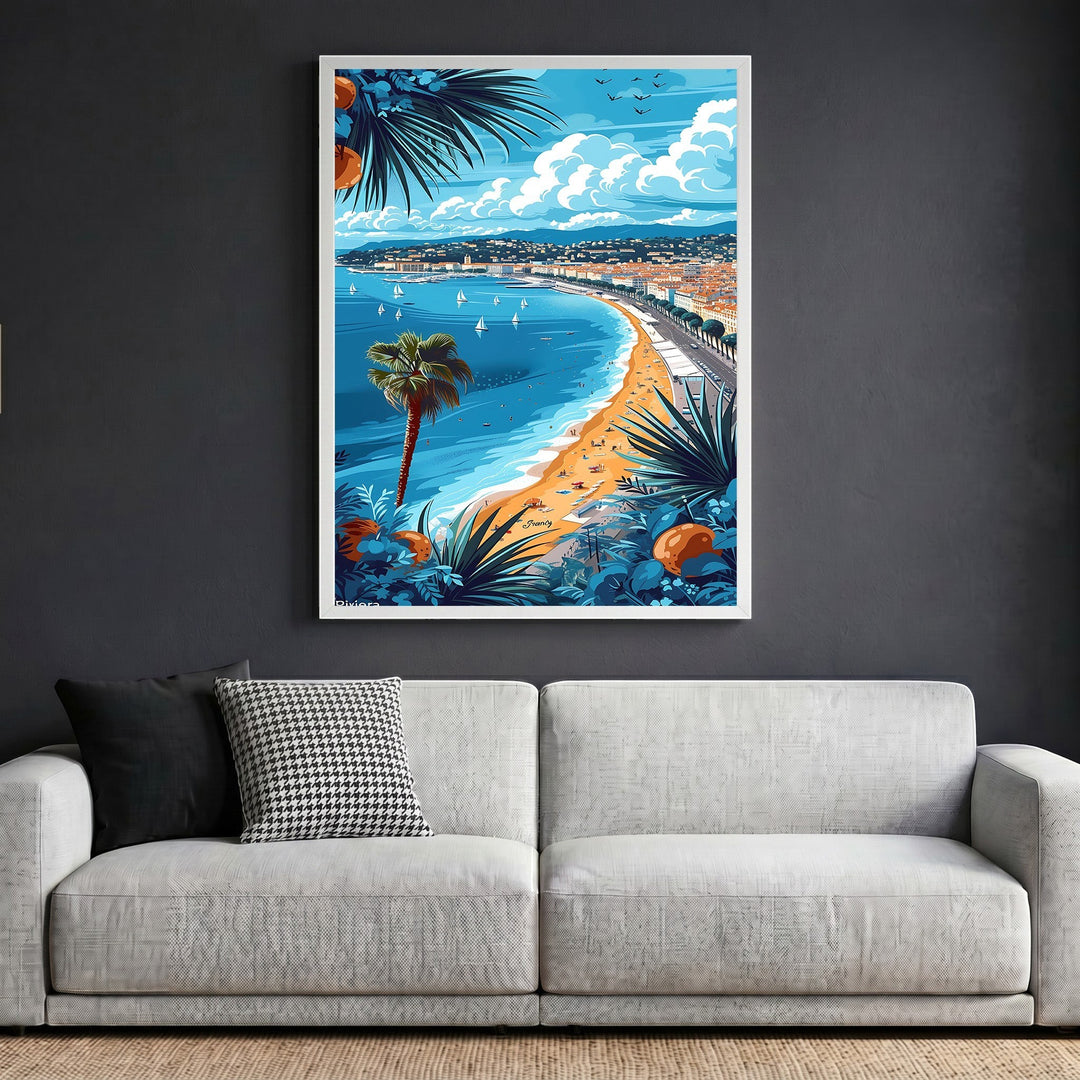 Wadi Home framed glossy print of a vibrant French Riviera beach scene with palm trees and blue sea above a sofa.