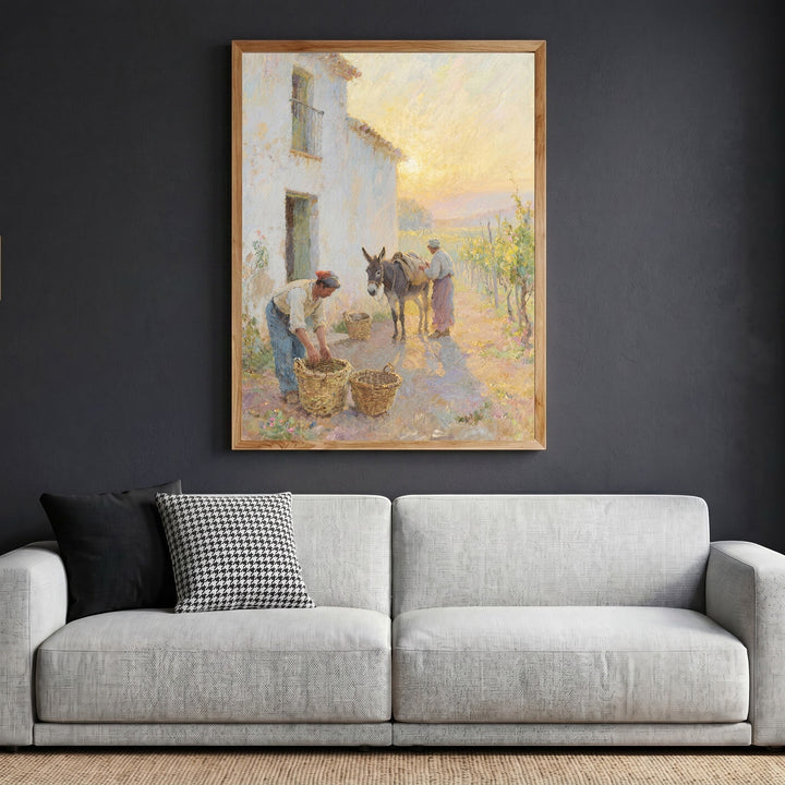 Wadi Home framed impressionist wall art print of a sun-drenched rural farm scene hanging above a modern grey sofa.