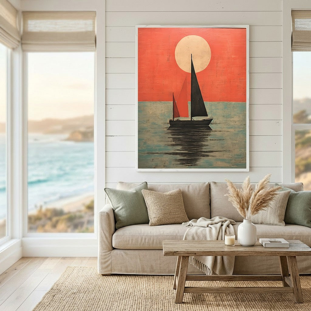 Wadi Home framed sailboat at sunset wall art print with red and teal tones hanging above a neutral living room sofa.