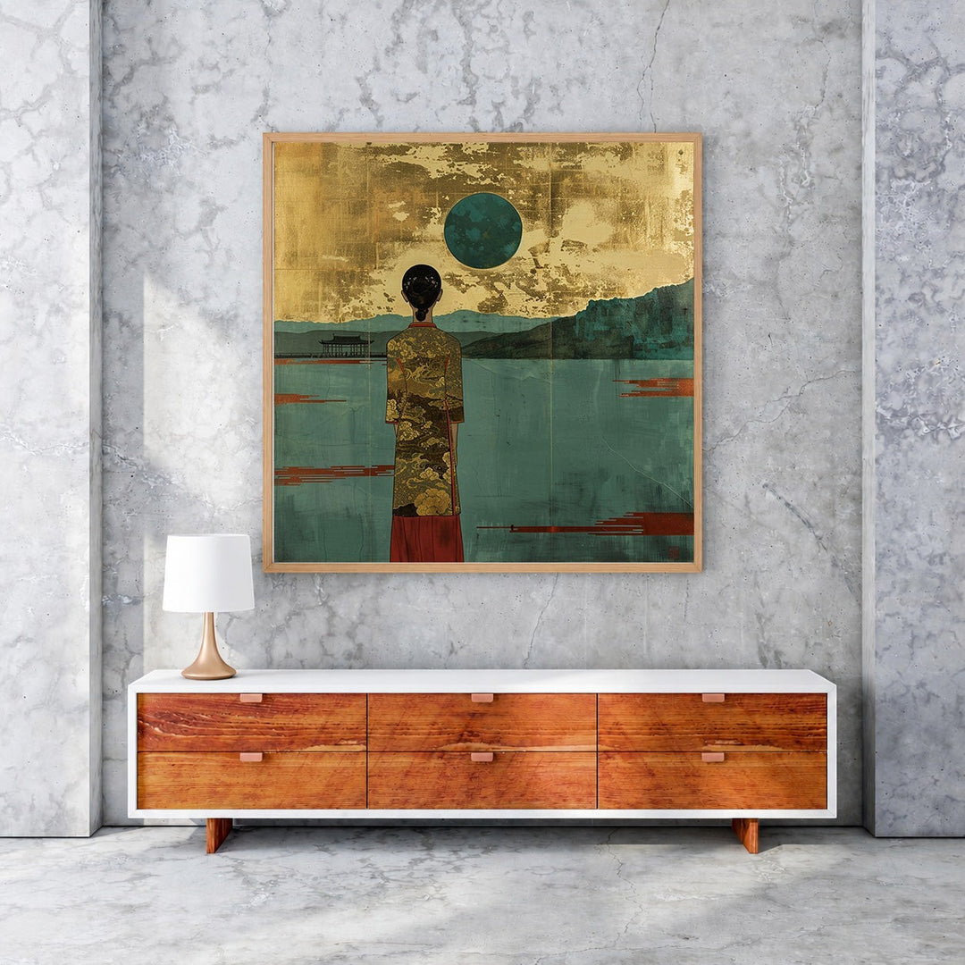 Wadi Home framed wall art depicting a figure in a kimono facing a teal moon over a serene landscape with gold accents.