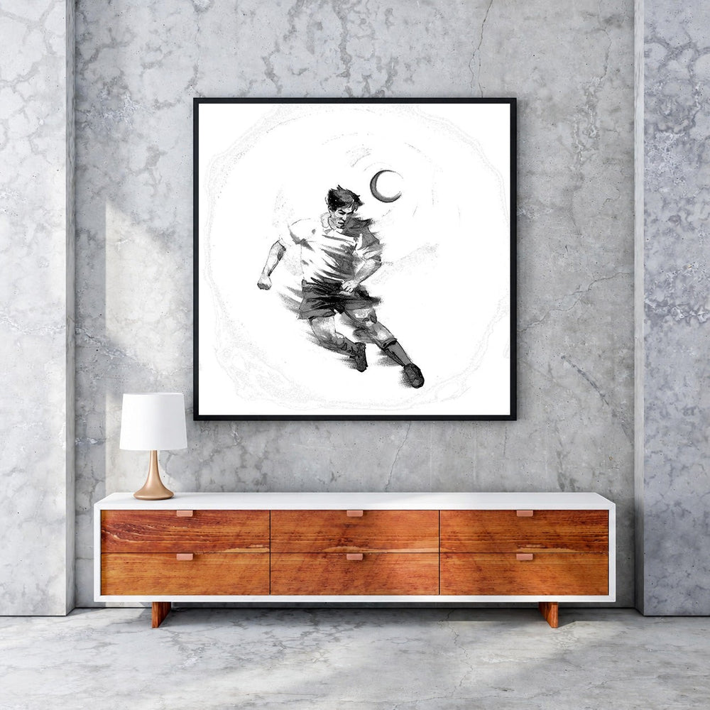 Wadi Home black and white sketch artwork of a soccer player dribbling a ball under a crescent moon.