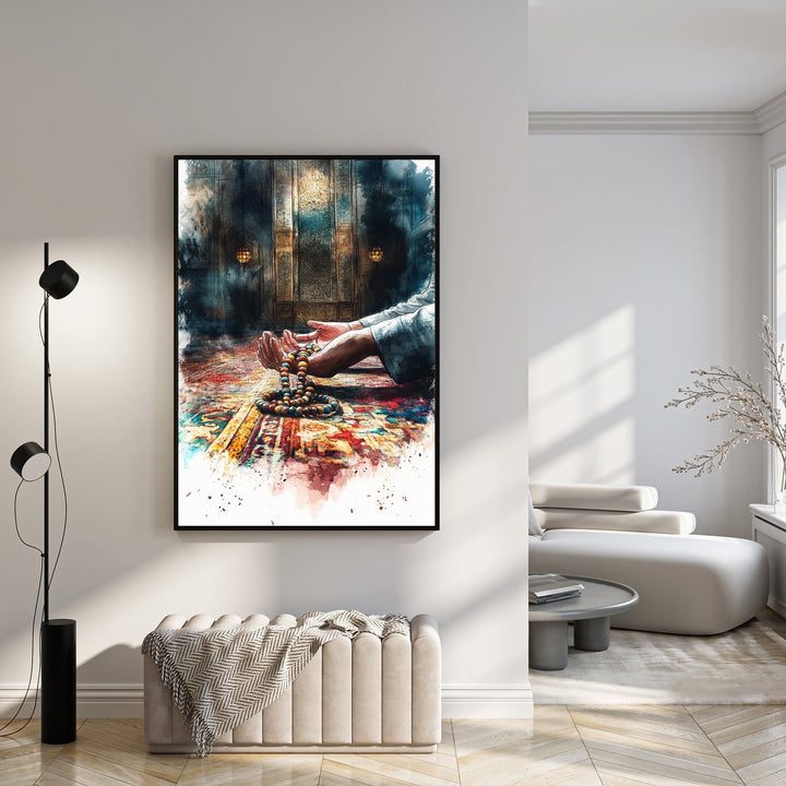 Wadi Home spiritual artwork of hands holding prayer beads, with vibrant watercolor splashes on a patterned rug.