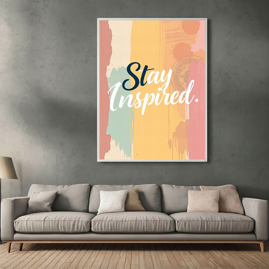 Wadi Home Stay Inspired wall art print with abstract yellow, pink, and teal brushstrokes above a modern grey sofa.