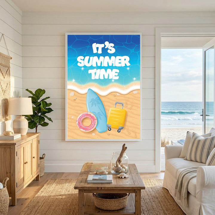 Wadi Home summer vacation wall art print featuring a surfboard, suitcase, and pool floatie on a beach in a living room