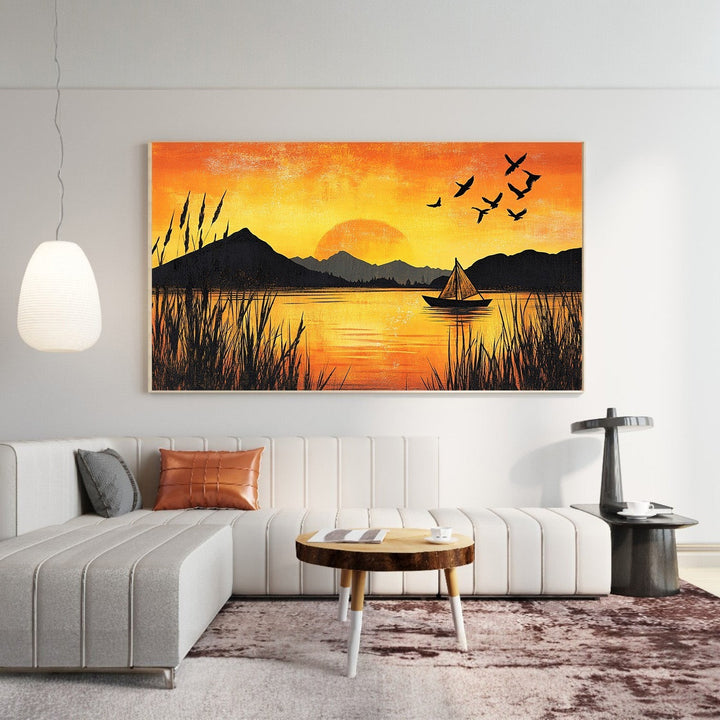 Wadi Home sunset lake landscape wall art print featuring a sailboat, mountains, and birds in orange and black tones.