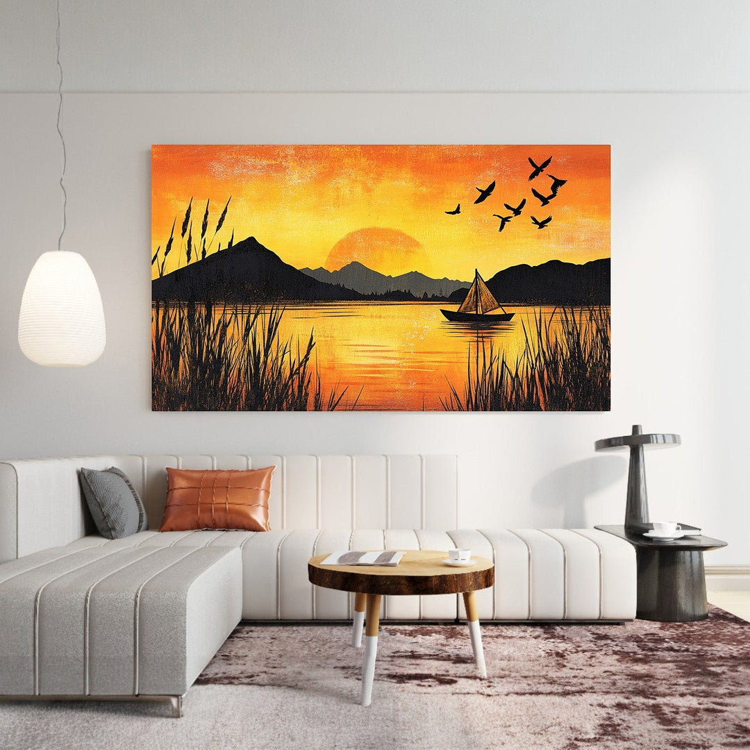 Wadi Home sunset lake landscape wall art print featuring a sailboat and birds above a modern white living room sofa.