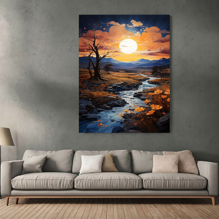 Wadi Home sunset landscape wall art print featuring a winding stream and golden hills above a modern grey sofa.