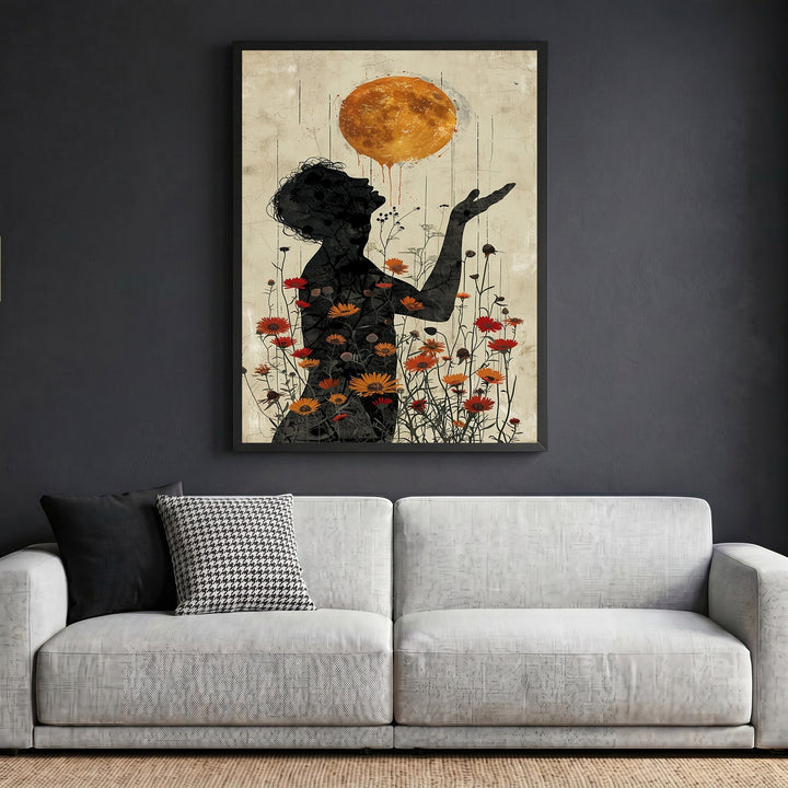 Wadi Home surreal floral silhouette wall art print featuring a golden sun orb and wildflowers in a black frame.