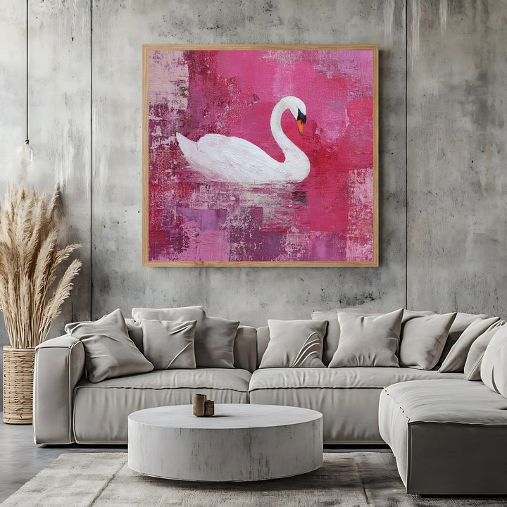 Wadi Home elegant swan wall art canvas with white swan on textured magenta background hanging above a modern sofa.
