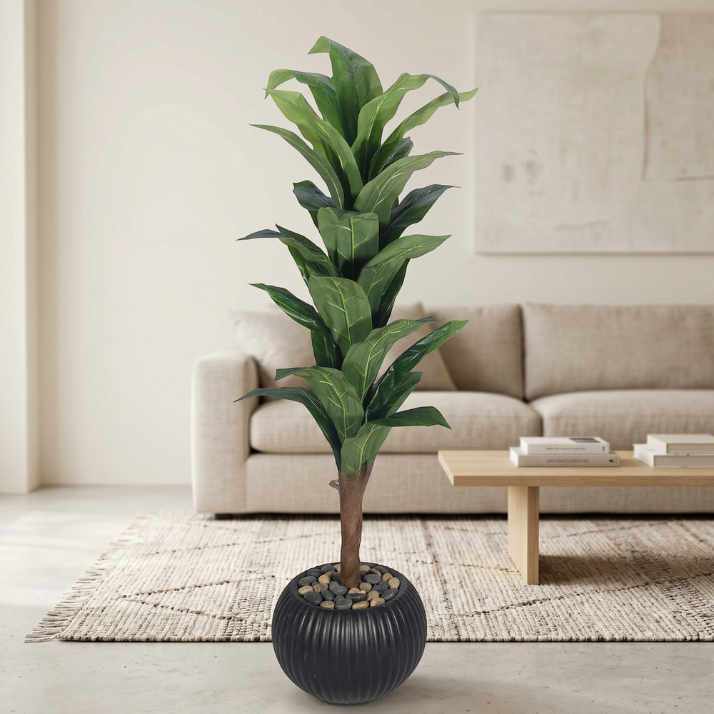 Wadi Home Tall Fiddle Leaf Fig Tree in black ribbed planter with stone fill. Realistic artificial plant with large green leaves.