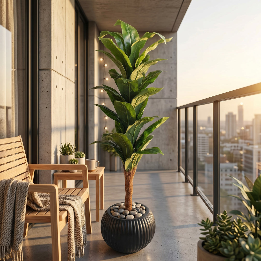 Wadi Home Tall Fiddle Leaf Fig Tree in black ribbed planter with stone fill. Realistic artificial plant with large glossy green leaves.