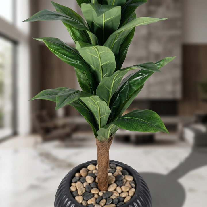 Wadi Home Tall Fiddle Leaf Fig Tree in a black ribbed planter with stone fill. Realistic artificial plant with large, glossy green leaves.