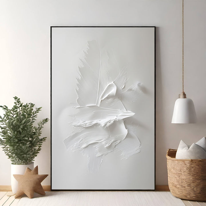 Wadi Home textured abstract wall art with bold white dimensional brushstrokes in a black frame.