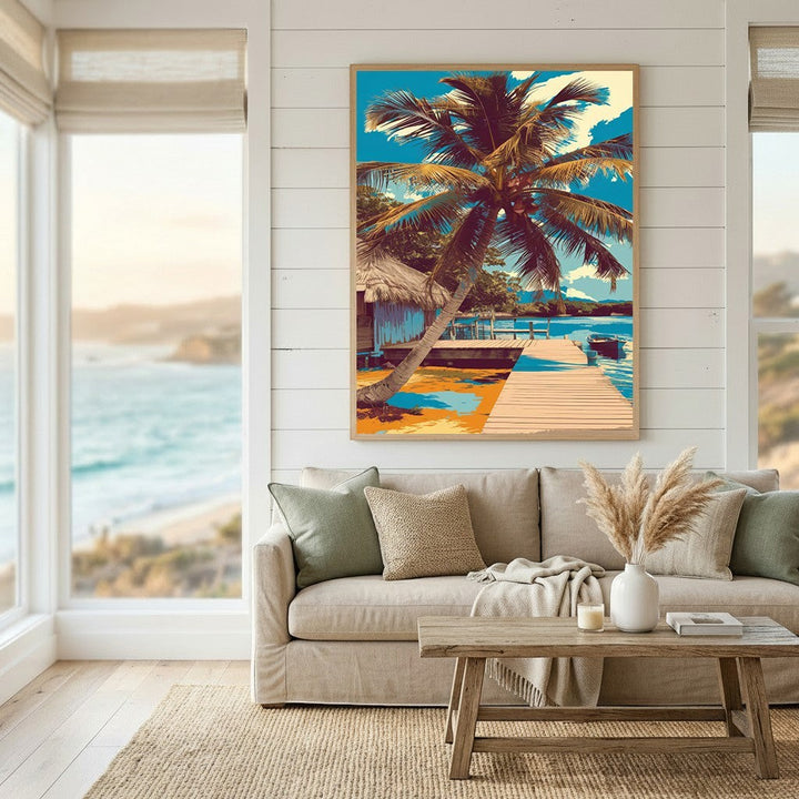 Wadi Home tropical coastal landscape art print featuring a palm tree and wooden pier above a beige sofa in a living room