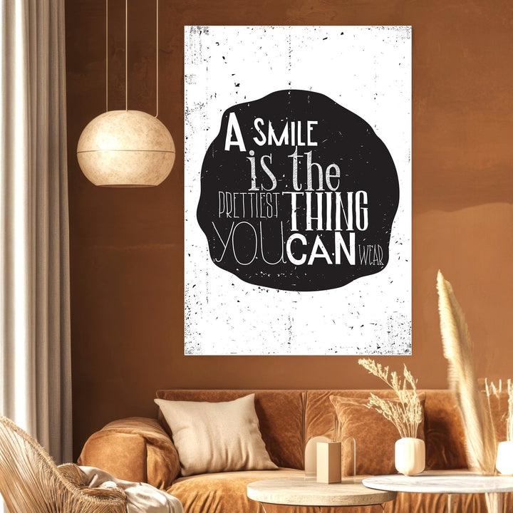 Wadi Home typography wall art print with a smile quote on a textured black shape in a modern living room interior.