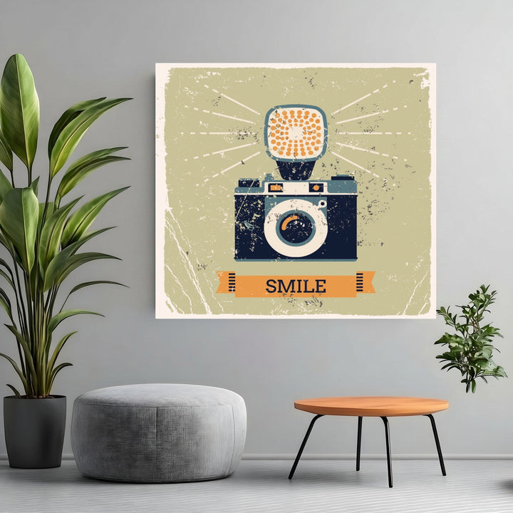 Wadi Home vintage camera wall art print with distressed texture and SMILE banner displayed in a modern living room.