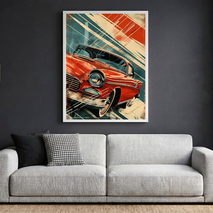 Wadi Home vintage automotive wall art print featuring a stylized red classic car in a white frame above a grey sofa.