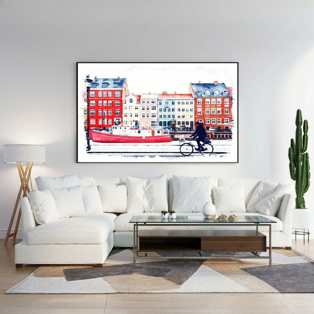 Wadi Home watercolor print of a red boat docked by colorful buildings with a cyclist riding by a canal.