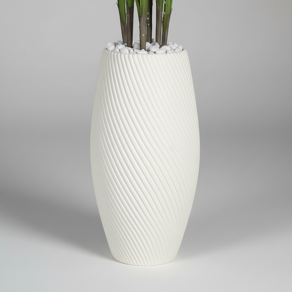 Wadi Home artificial plant in a tall white textured floor vase with spiral ribbed design and decorative stone base