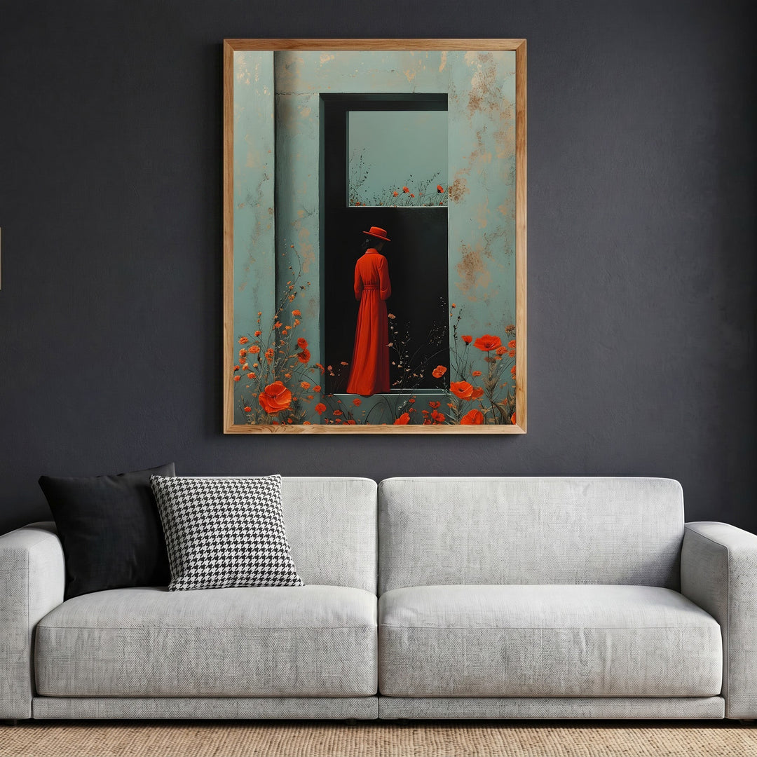 Wadi Home framed wall art featuring a woman in a red dress and hat standing in a doorway with poppies on a grey wall