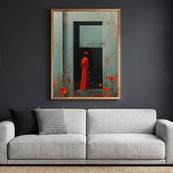 Wadi Home framed wall art featuring a woman in a red dress and hat standing in a doorway with poppies on a grey wall