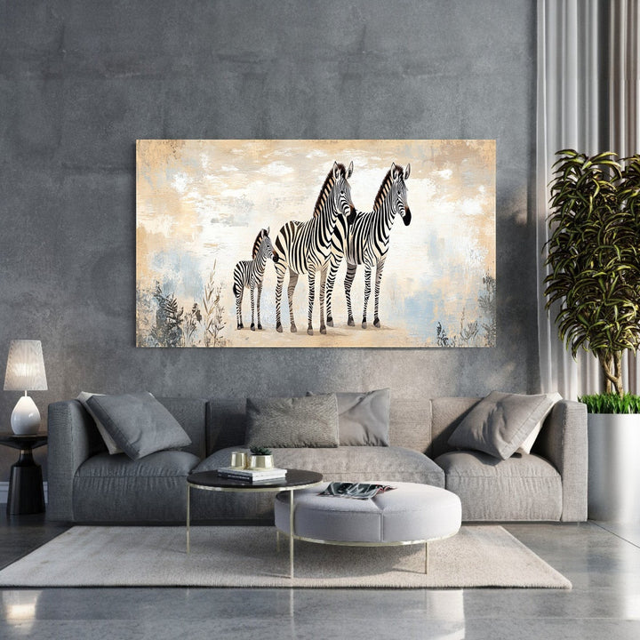 Wadi Home canvas print of three zebras, two adults and a foal, in a savannah landscape with abstract textured background.