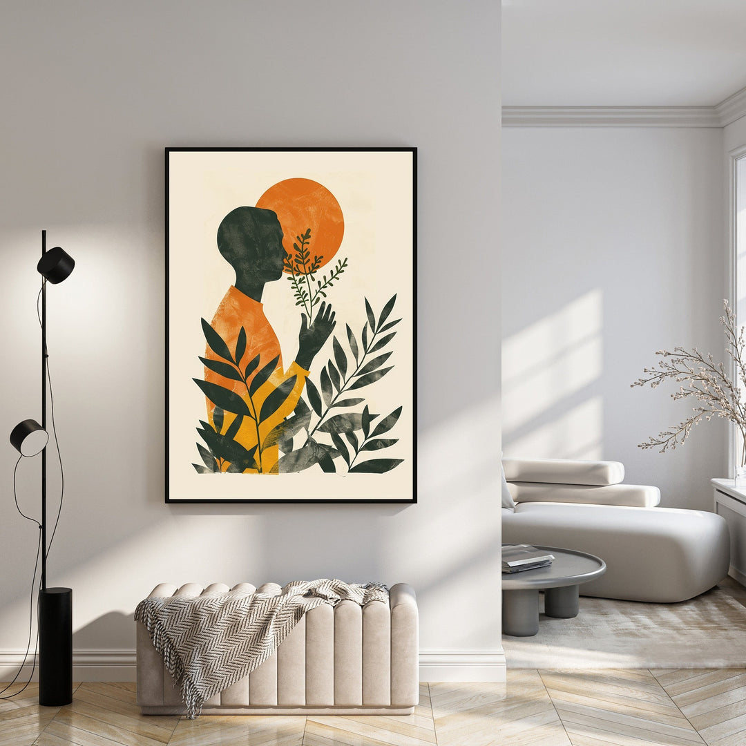Wadi Home abstract wall art featuring a dark silhouette of a person smelling plants with an orange sun in the background.