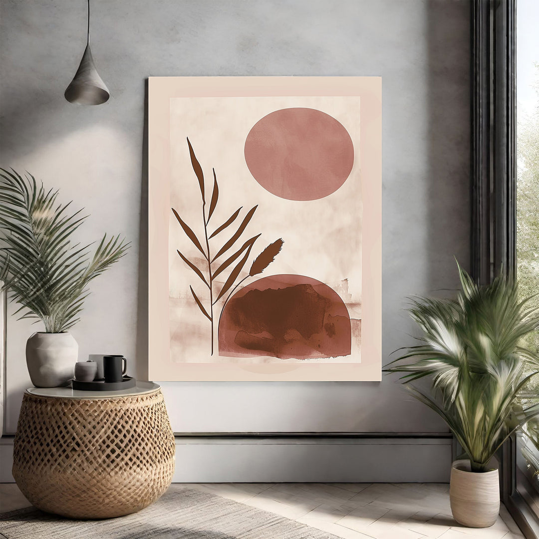 Wadi Home abstract botanical sunburst wall art in earthy tones with minimalist design. Features a pink sun and brown botanical elements.