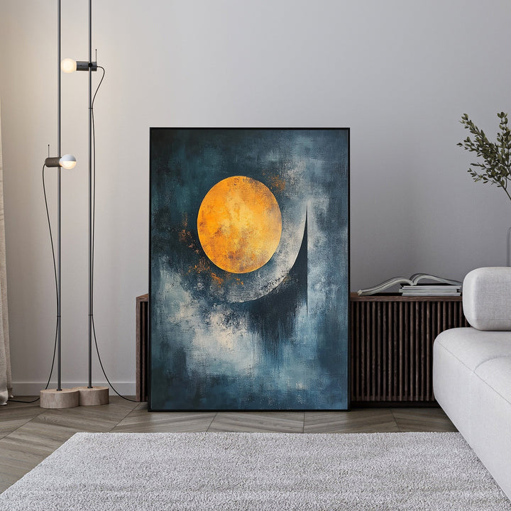 Wadi Home abstract celestial sphere wall art with textured orange sphere on moody blue background.