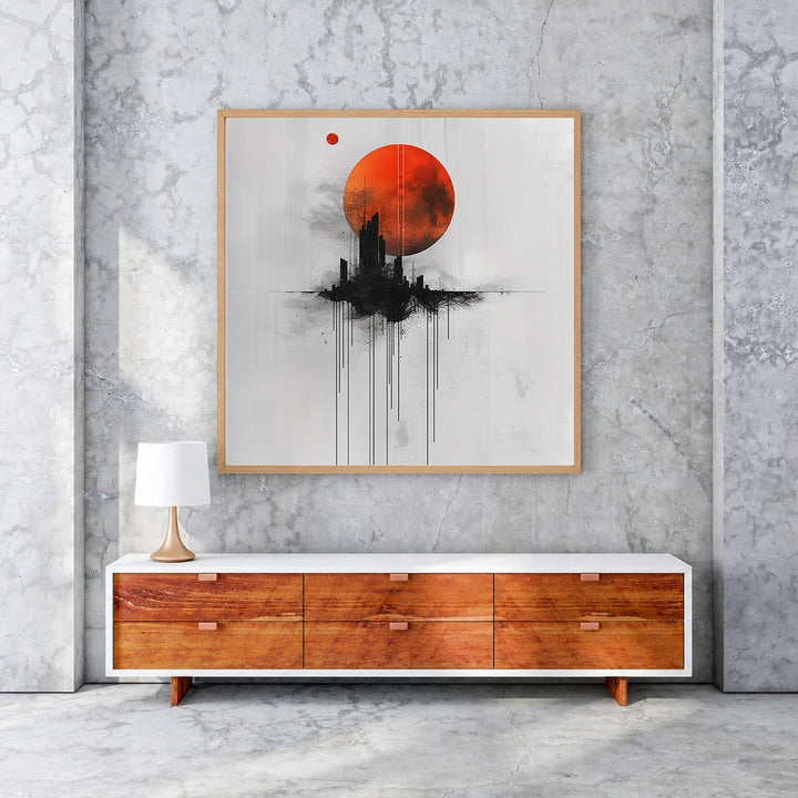 Wadi Home abstract cityscape wall art with a large red moon and black silhouetted buildings.
