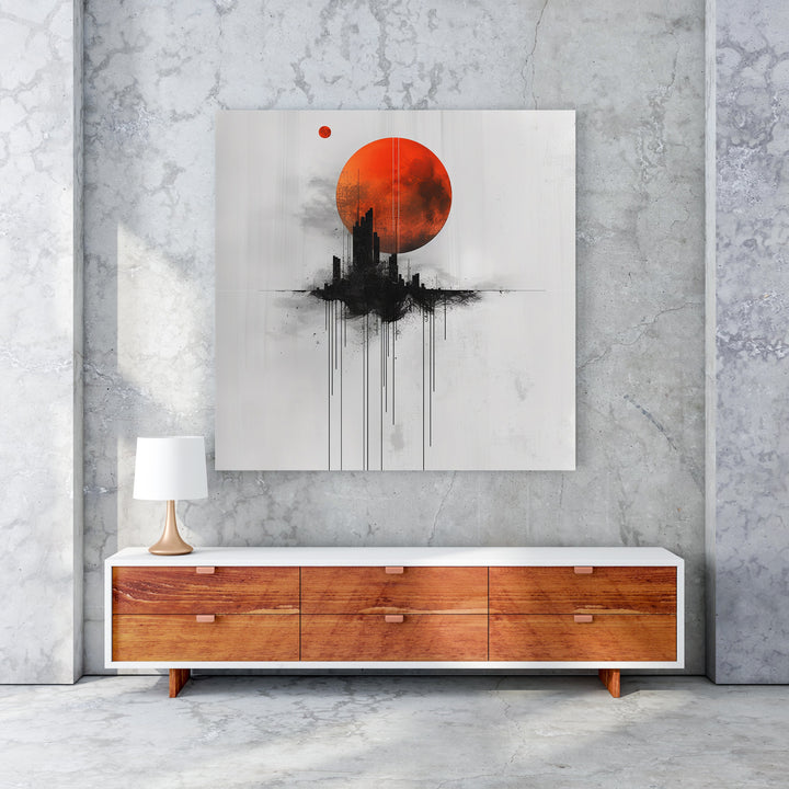 Wadi Home abstract cityscape wall art with a large red moon and black silhouetted buildings.