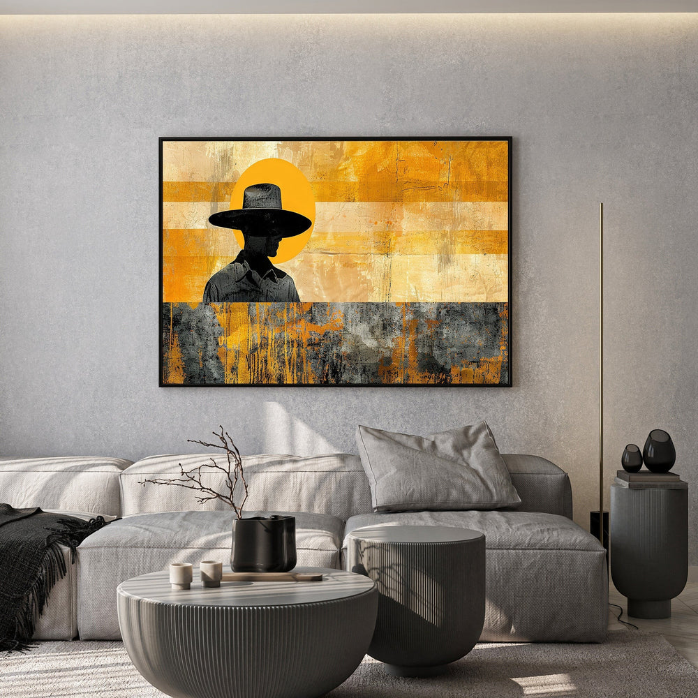Wadi Home abstract cowboy silhouette wall art with black cowboy figure against yellow and grey textured background.