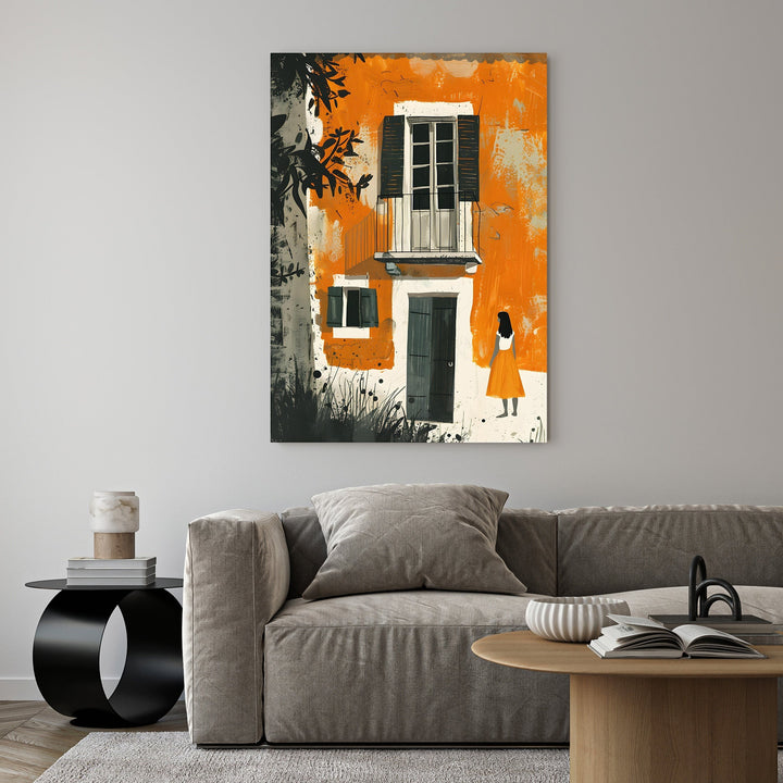 Wadi Home abstract artwork of an orange European building with a balcony and a solitary figure in an orange dress.